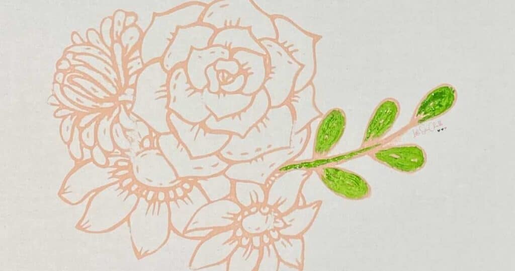 Close up of outline of flowers with leaves painted in green watercolor for blog post Try Your Hand at Watercoloring with Chalk Couture