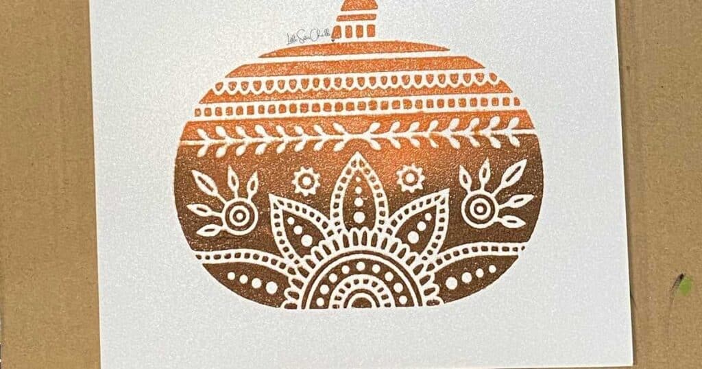 A pumpkin chalked using orange and brown paste colors in an ombre effect for the blog post The Chalk Couture Ombre Effect