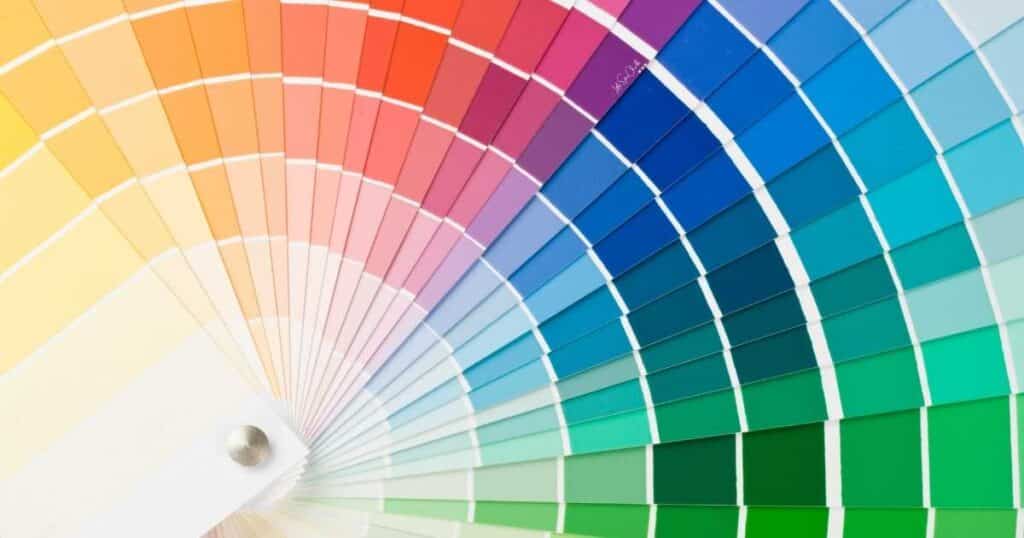 Fanned out color swatches from yellow to green for blog post 10 Tips for Finding Inspiration for Your Chalk Couture Projects