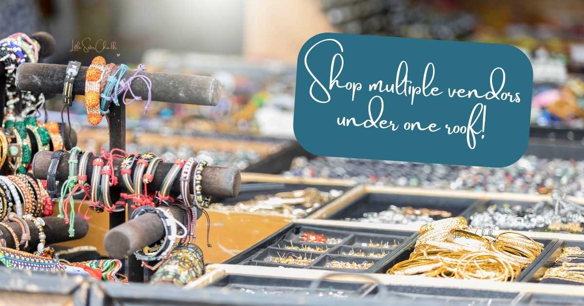 Blurred photo of a table filled with jewelry for blog post Pump Up Your Shopping Experience with Multi-vendor Markets