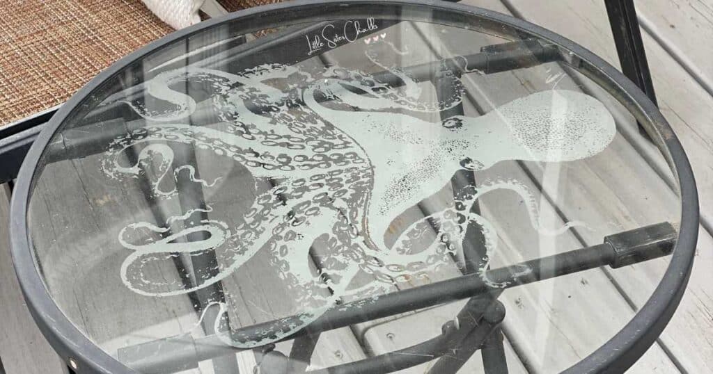 An etched octopus on a glass patio table for the blog post Etching with Chalk Couture