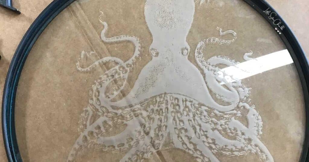 An etched octopus on a glass patio table top for the blog post Etching with Chalk Couture