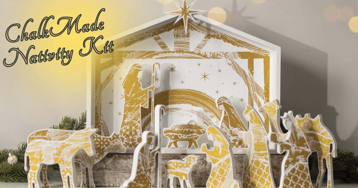 A wooden nativity scene chalked in shimmer gold chalk paste including a stable, a star, Jesus, Mary, Joseph, the 3 wise men, a camel, a donkey, a sheep, a cow, and a shepherd for the blog post "Classic ChalkMade Nativity Kit".