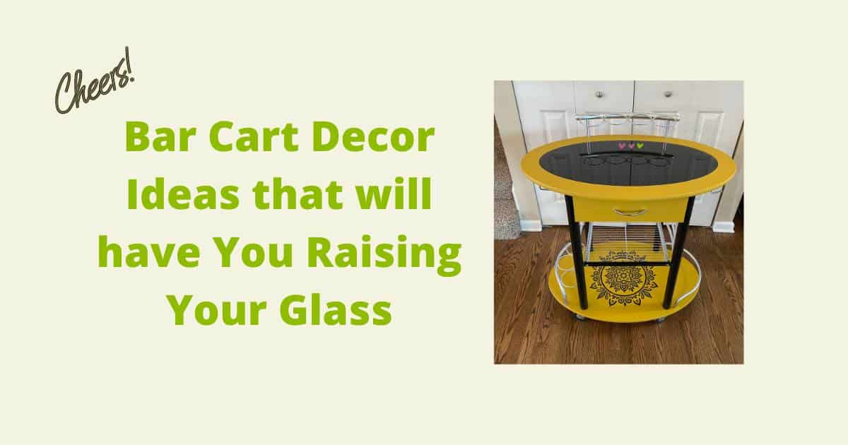 A picture of a mustard colored bar cart with a floral medallion on the bottom tier with the "Cheers!" in the upper left corner for the blog "Bar Cart Decor Ideas that will have You Raising Your Glass".