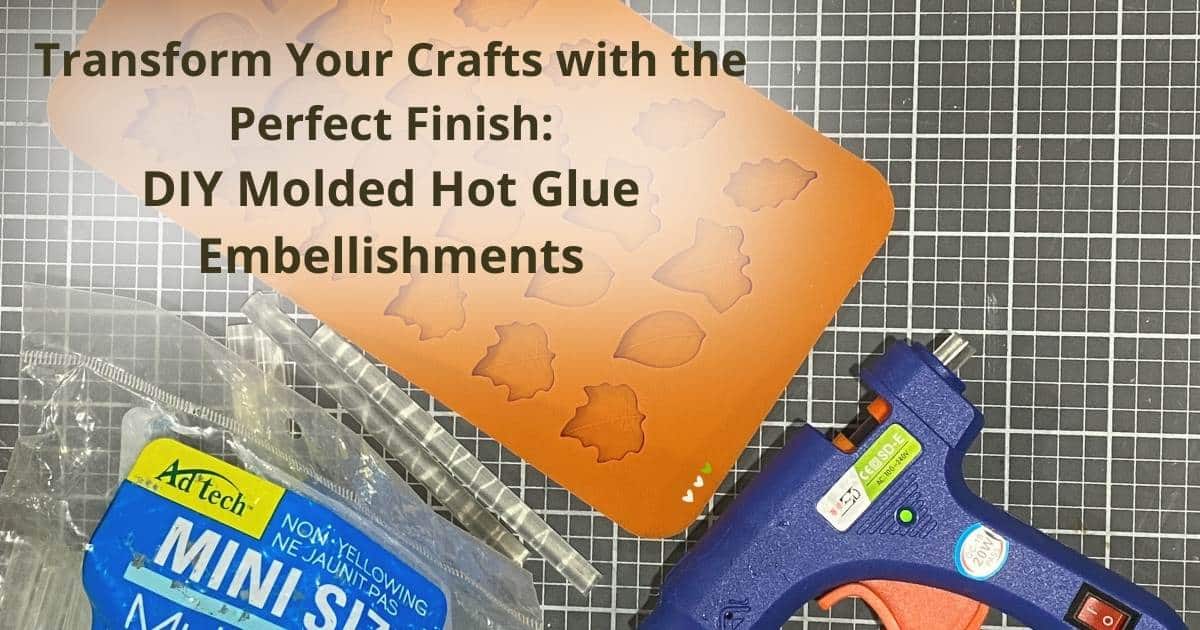 A photo of a silicone leaf mold, mini glue sticks and a glue gun on a craft mat for the blog "Transform Your Crafts with the Perfect Finish: DIY Molded Hot Glue Embellishments".