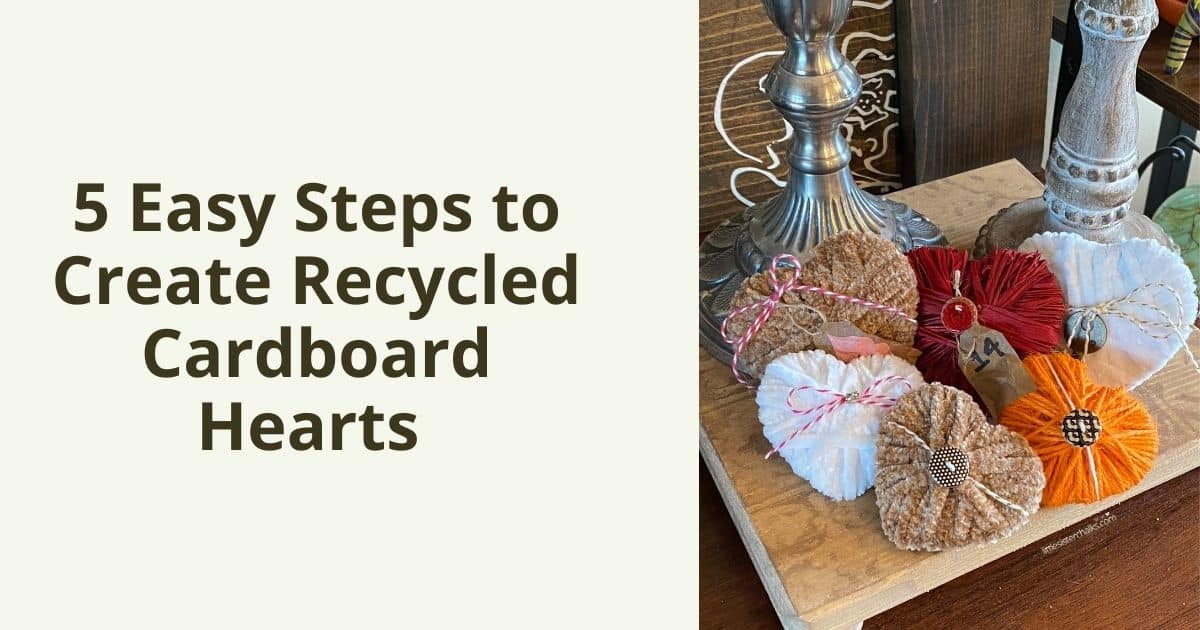 The words 5 Easy Steps to Create Recycled Cardboard Hearts flanked by a photo of dimensional hearts in tan, white, orange and red, on a wood riser with two candlesticks.