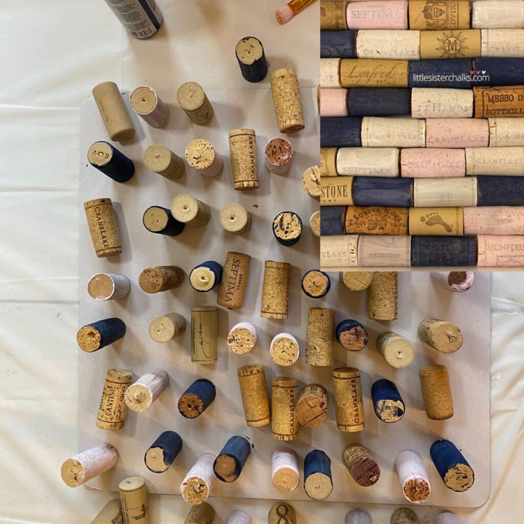 Wine corks on a table in the process of being painted in white, navy and pink, with an inset of the painted corks mixed with natural corks, for the blog post "Create a Chic Wine Cork Board in 5 Easy Steps".