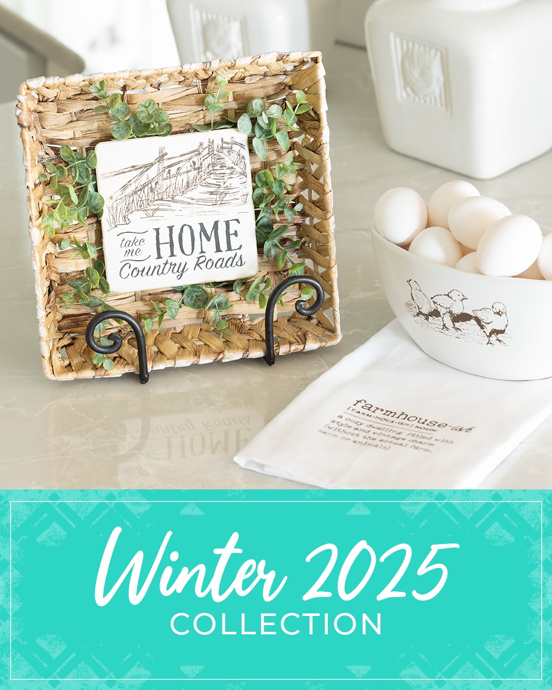 A basket, egg dish and tea towel on a white counter decorated with a farmhouse-ish Chalk Couture stencil design for the launch of the Winter 2025 Collection.